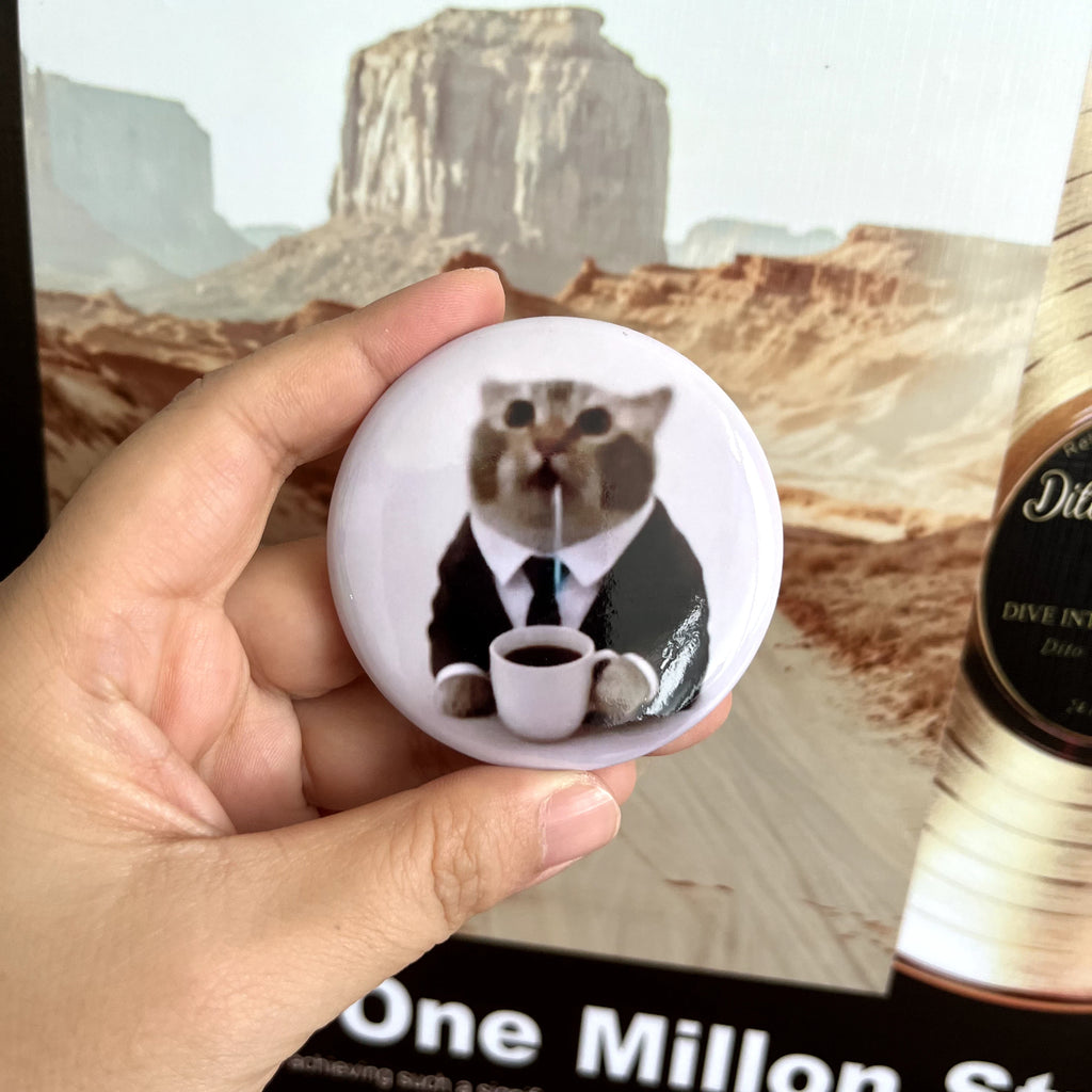 Drooling Kitten Badge