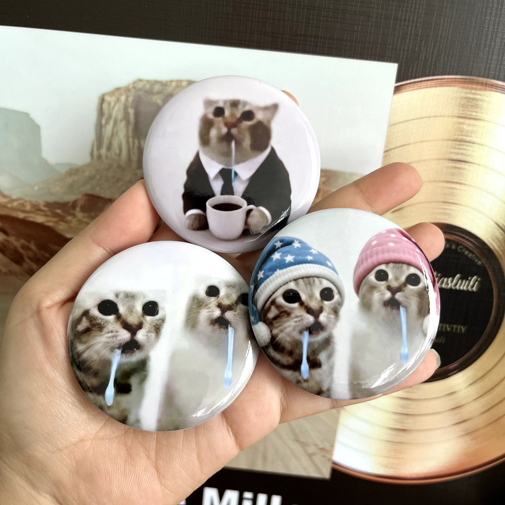Drooling Kitten Badge
