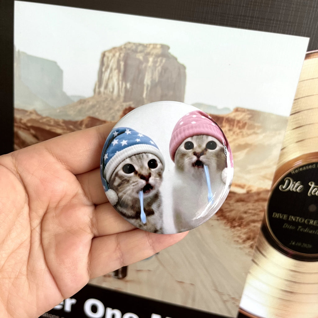 Drooling Kitten Badge